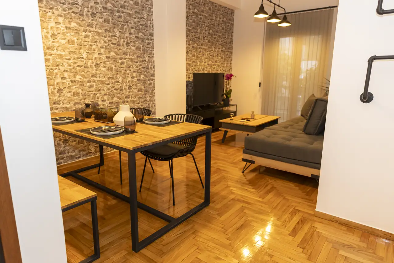 Dining table by the brick wall
