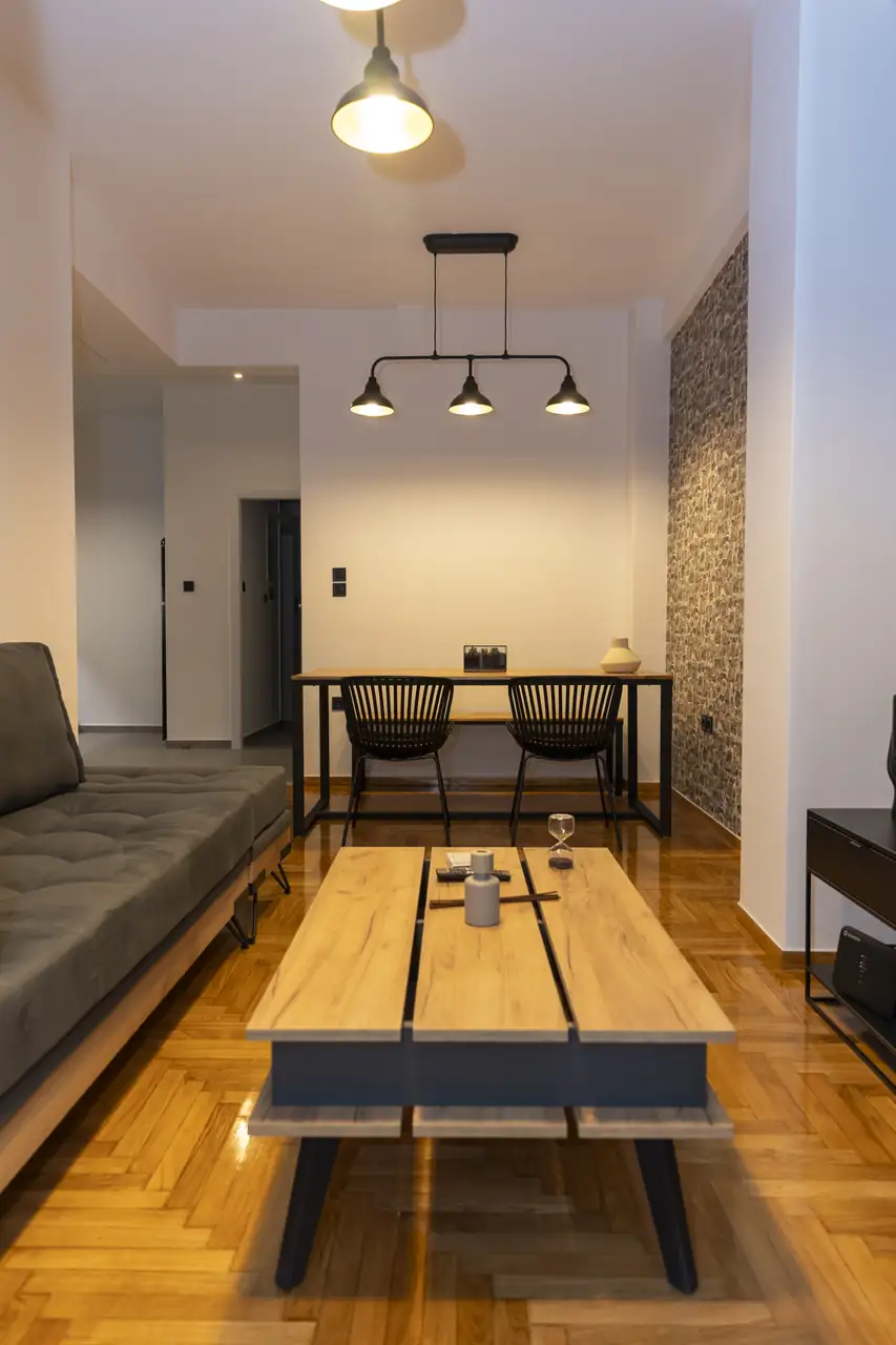 Living and dining room with herringbone parquet